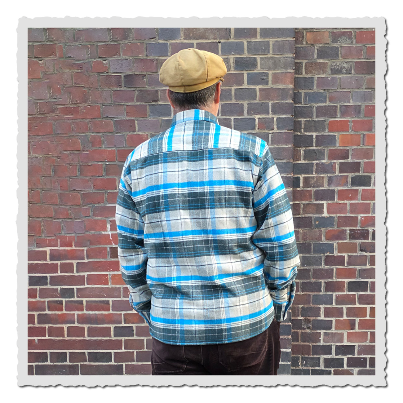 Pike Brothers CPO Shirt – Rückenansicht des Workwear-Hemd in Grün, Blau und Creme